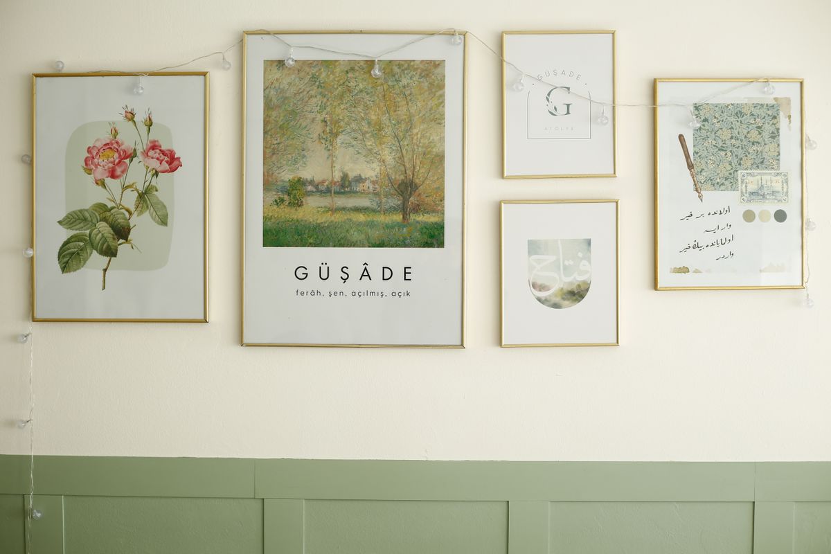 Botanical framed prints arranged on a wall illustrating a magnolia gallery wall A wall arrangement of botanical and abstract framed prints, illustrating a magnolia gallery wall