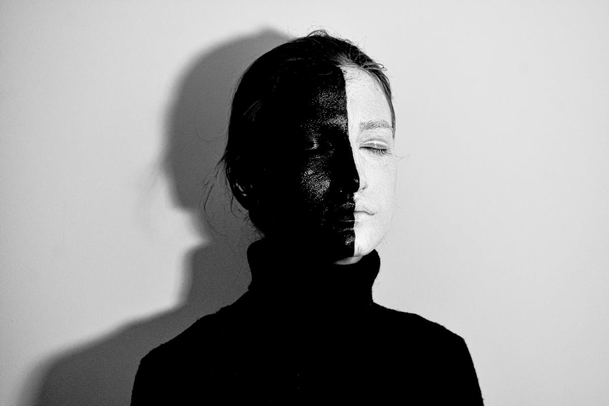 Mirror silhouette abstract identity formation mirror recognition psychology Minimal mirror and silhouette setup suggesting identity formation and mirror recognition in psychology