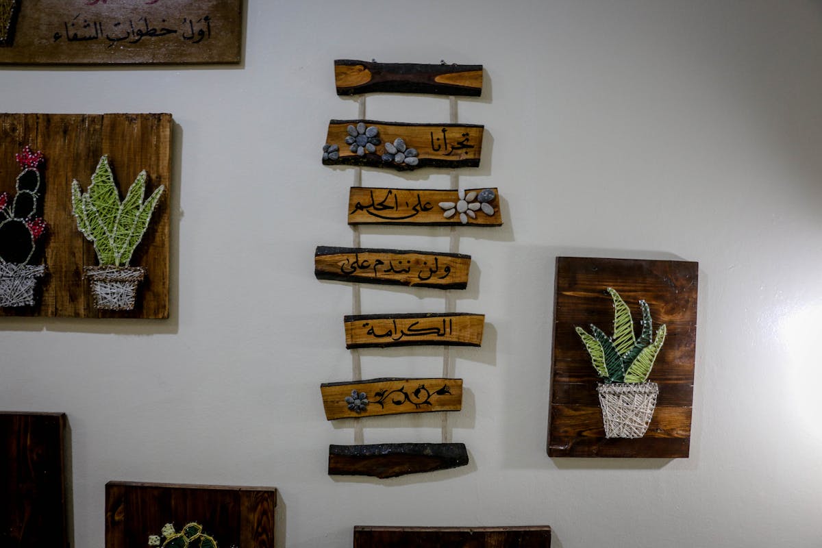 Handcrafted wooden wall plaques with intricate detail, illustrating carved wooden wall decorations